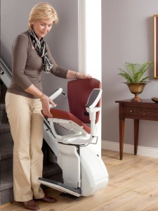 homeglide extra straight stairlift woman folding